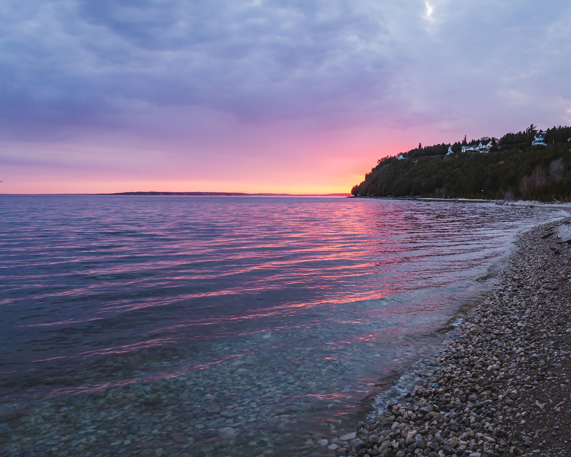 Contact Mackinac Island Jobs and you could see a pink sunset like this one.